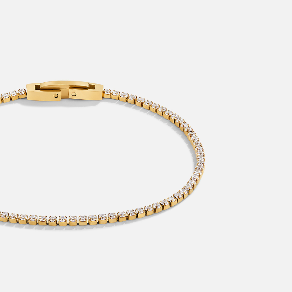 Niyah – Bracciale dorato con cristalli.